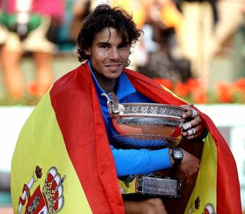 05.06.2011 French Open Tennis, Paris, France, World number one Rafael Nadal won a record-equalling sixth French Open title at Roland Garros. Nadal with his winners trophy wrapped in the Spain flag xMichaelxCullenx  ActionPlus11179979