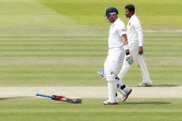 Cricket - NPower Test - England vs. Sri Lanka Matt Prior of England throws his bat down as he is run out at Lords 