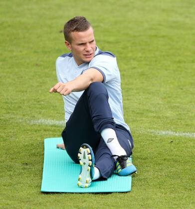 Englands Tom Cleverley in action Training Training - England U21 14th June, 2011 EDITORIAL USE ONLY. No use with unauthorised audio, video, data, fixture lists, club league logos or live services. Online in-match use limited to 120 images, no video emulation. No use in betting, games or single club league player publications.