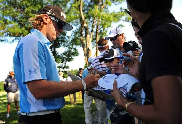 Hunter Mahan signs autographs during a practice round prior to the U.S. Open at Congressional Country Club in Bethesda, Maryland on June 14, 2011.  WAP20110614314