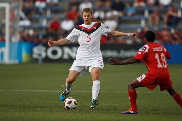 June 14, 2011: Canada defender AndrÅ½ Hainault (5) tries to get past Panama midfielder Alberto Abdiel Quintero Medina (19) during a CONCACAF Gold Cup first round game between Canada and Panama at Livestrong Sporting Park in Kansas City, Kansas. SOCCER: JUN 14 CONCACAF Gold Cup - First Round - Canada v Panama Icon11061410 EDITORIAL USE ONLY