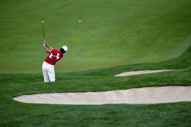 June 17, 2011 - Bethesda, Maryland, U.S. - KYUNG-TAE KIM hits his second shot from the fairway bunker on the 15th hole at Congressional Country Club during the second round of the U.S. Open in Bethesda, MD. Golf 2011- US Open Second Round - ZUMAmv2