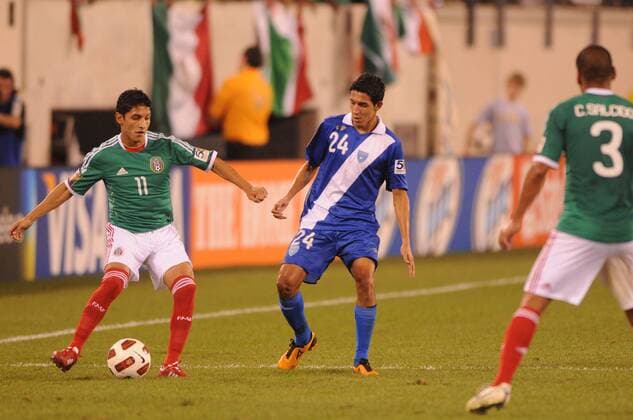 June 18, 2011 - East Rutherford, New Jersey, U.S - Guatemala s Jonathan Lopez (24) marks Mexico s Angel Reyna (11) during second half CONCACAF Gold Cup soccer quarterfinal action where Mexico defeated Guatemala 2-1 at the New Meadowlands Stadium in East Rutherford, N.J. CONCACAF Gold Cup Soccer - June 18 - Mexico vs Guatemala - ZUMAx50