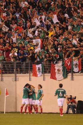 June 18, 2011 - East Rutherford, New Jersey, U.S - Mexican players and fans celebrate Javier Hernandez game winning goal during second half CONCACAF Gold Cup soccer quarterfinal action where Mexico defeated Guatemala 2-1 at the New Meadowlands Stadium in East Rutherford, N.J. CONCACAF Gold Cup Soccer - June 18 - Mexico vs Guatemala - ZUMAx50