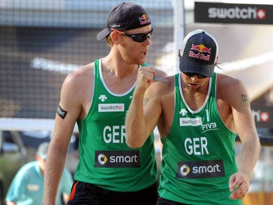BEACHVOLLEYBALL - FIVB WM 2011 ROM,ITALIEN,19.JUN.11 - DIVERS, BEACH VOLLEYBALL - FIVB Weltmeisterschaften, Herren. Bild zeigt den Jubel von Jonas Reckermann und Julius Brink (GER). 