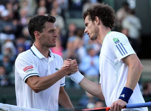 LONDON, June 22, 2011 -- Andy Murray (R) of Great Britain greets Tobias Kamke of Germany after the 2nd round match at the 2011 Wimbledon tennis championships in London, Britain, June 22, 2011. - 