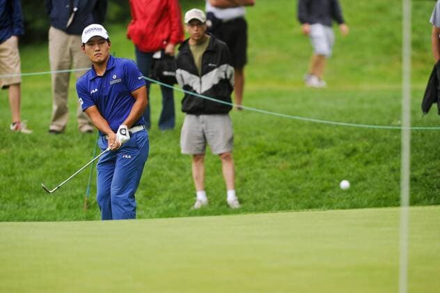 June 24, 2011 - Cromwell, Connecticut, U.S - Sunghoon Kang chips onto the 7th hole green during first round play of the Travelers Championship at the TPC River Highlands on Friday. PGA Golf Herren 2011 - Jun 24 - Travelers Championship First Round - ZUMAq39