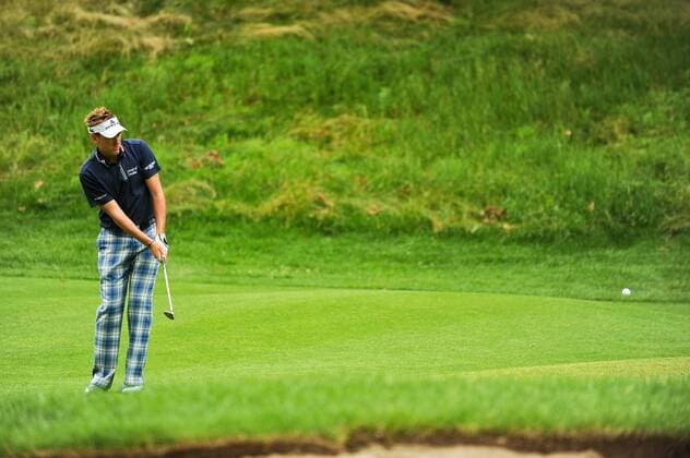 June 24, 2011 - Cromwell, Connecticut, U.S - Iam Poulter watches his chip onto the 14th hole during second round action at the Travelers Championship on Friday. PGA Golf Herren 2011 - Jun 24 - Travelers Championship Second Round - ZUMAq39
