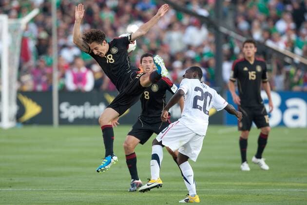 June 25, 2011 - Pasadena, California, U.S - Mexico midfielder Andres Guardado 18 (L) goes up for a header during the 2011 CONCACAF Gold Cup championship game between United States and Mexico at a sold out Rose Bowl. Mexico went on to defeat United States with a final score of 4-2. Gold Cup 2011 final - Jun 25 - United States vs Mexico  - ZUMAx72