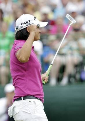 Yani Tseng of Taiwan reacts after her par putt on the 18th hole in the final round of the Wegmans LPGA Golf Damen Championship at Locust Hill Country Club in Rochester, New York on June 26, 2011. Yani Tseng wins the Tournament with a score of 19 under par.  NYP20110626135