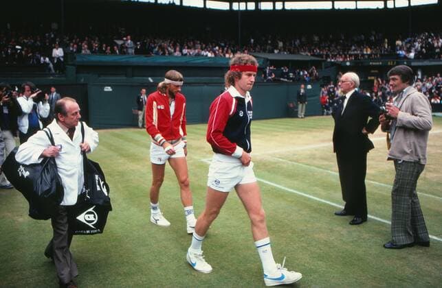 Tennis : Mens singles Final 1981 Wimbledon tennis Championships. John McEnroe leads ahead of Björn Borg onto Centre court. 