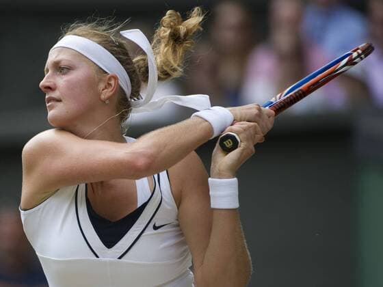 July 2, 2011 Petra Kvitova of Czech Republic raises her arms in celebration in the final at The Wimbledon Championships, played at the AELTC Club, London, England. TENNIS: JUL 02 Wimbledon Icon2501107021211 EDITORIAL USE ONLY