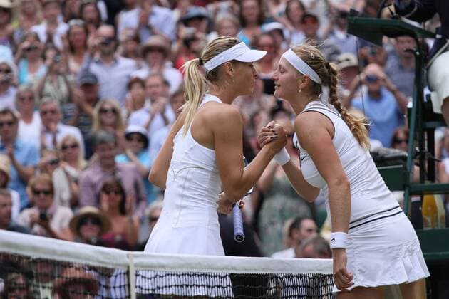 Wimbledon Day 12 . 02.07.2011, The Ladies Final. Maria Sharapova (RUS) congratulates Petra Kvitova (CZE) at the end. 