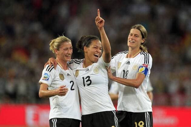 Football - soccer: FIFA Women s World Cup 2011, France (FRA) - Germany (GER), Bianca Schmidt (GER, 2), Celia Okoyino da Mbabi (GER, 13) and Kerstin Garefrekes (GER, 18) celebrate goal (2:4) xHOCHxZWEIx xPhilippxSzyzax