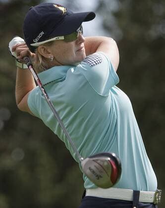Australia s Karrie Webb tees off on the eleventh hole during the third round of the U.S. Women s Open at the Broadmoor East Course in Colorado Springs on July 10, 2011.  COS2011071025