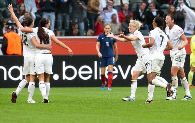 Team USA with Amerika s Megan RAPINOE (M) and scorer Amerika s Alex MORGAN (2.L) celebrate the 3:1 during the semifinal match of the Women s Soccer World Cup between USA and France, Borussiapark in Moenchengladbach on July 13., 2011. Mika