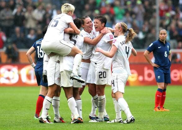 Team USA with Amerika s Megan RAPINOE (L) and Amerika s Abby WAMBACH (20) celebrate the victory during the semifinal match of the Women s Soccer World Cup between USA and France, Borussiapark in Moenchengladbach on July 13., 2011. Mika