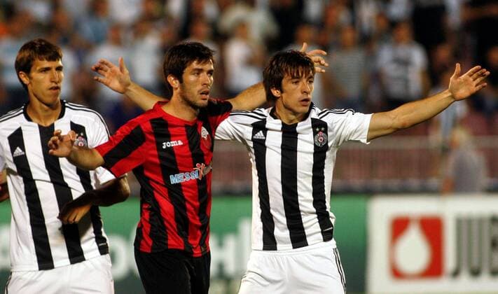 Belgrade, FK Partizan-KF Shkendija 79 Uefa champions league second qualifying round Marko Scepovic(L) with Vladimir Volkov(r) FK Partizan and Muhamed Huseini(c) KF Shkendija :  FK Skendija Tetovo (Mazedonien)