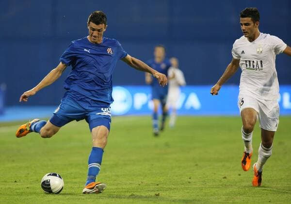 Zagreb, 13.07.2011. 2nd qualifying round UEFA Champions League - First Leg GNK Dinamo Zagreb (blue) - Neftci Baku PFK (white) Ivan Krstanovic (b) and Ruslan Adishov (w)