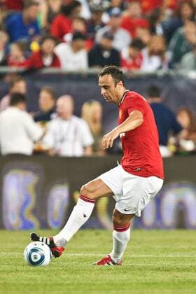July 13, 2011 - Foxborough, Massachuestts, U.S - Manchester United forward Dimitar Berbatov (9) takes the ball across midfield during the first half of the match against the New England Revolution. Manchester United defeated the New England Revolution 4 - 1. MLS Fussball Herren USA 2011- July 13 - New England Revolution vs Manchester United - ZUMAx25