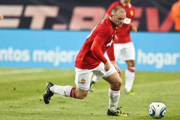 July 13, 2011 - Foxborough, Massachuestts, U.S - Manchester United forward Wayne Rooney (10) moves the ball into scoring position during the first half of the match against the New England Revolution. Manchester United defeated the New England Revolution 4 - 1. MLS Fussball Herren USA 2011- July 13 - New England Revolution vs Manchester United - ZUMAx25