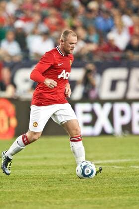July 13, 2011 - Foxborough, Massachuestts, U.S - Manchester United forward Wayne Rooney (10) moves the ball across field during the first half of the match against the New England Revolution. Manchester United defeated the New England Revolution 4 - 1. MLS Fussball Herren USA 2011- July 13 - New England Revolution vs Manchester United - ZUMAx25