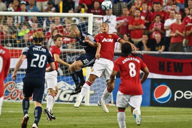 July 13, 2011 - Foxborough, Massachuestts, U.S - Manchester United forward Nemanja Vidic (15) makes a head shot during the opening minutes of the friendly match against the New England Revolution. Manchester United defeated the New England Revolution 4 - 1. MLS Fussball Herren USA 2011- July 13 - New England Revolution vs Manchester United - ZUMAx25