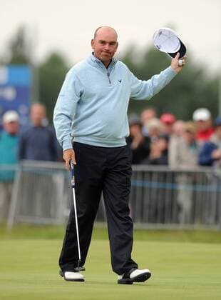 Golf - The Open 2011 - Royal St George s Thomas Bjorn (DEN) waves to the crowd as he completes his first round in 65 to give him the early lead at Royal St George s, Sandwich 
