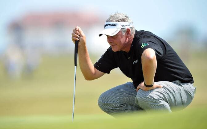 Golf - The Open 2011 - Royal St George s - Day 2 Darren Clarke (NI) lines up a putt at Royal St George s, Sandwich 
