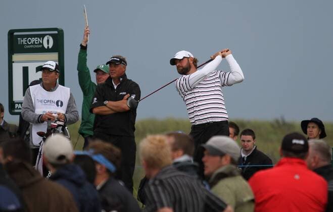 Lucas Glover drives on the 13th tee on the third day of the 140th Open Championship at Royal St Georges Golf club in Sandwich,England on Saturday, July 16, 2011.  LON2011071609
