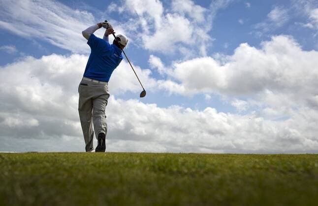 Golf - The Open 2011 - Royal St George s - Day 4 - Golf Player  o0 Spieler Golfspieler hinten, Rücken, Rückansicht Wolken Drive Abschlag