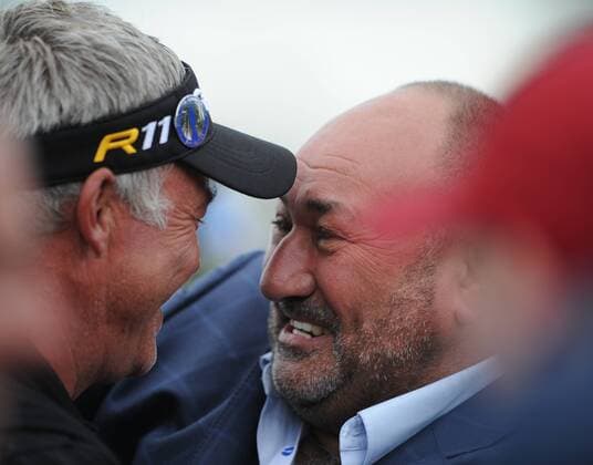 Golf - The Open 2011 - Royal St George s - Day 4 Darren Clarke of Northern Ireland (left) is hugged by his manager Andrew Chubby Chandler after winning the Open Championship at Royal St George s, Sandwich 