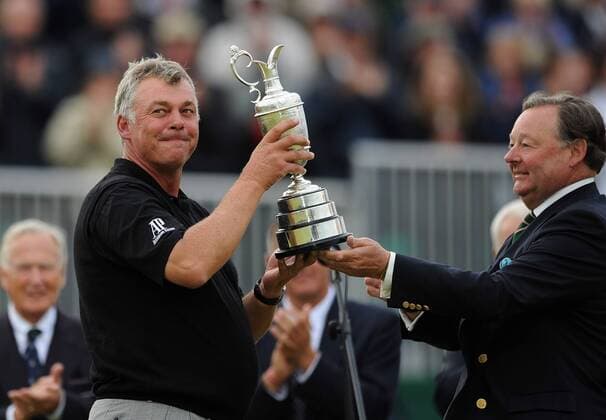 Golf - The Open 2011 - Royal St George s - Day 4 Darren Clarke of Northern Ireland is presented with the Clajet Jug after winning the Open Championshp at Royal St Georges, in Sandwich 