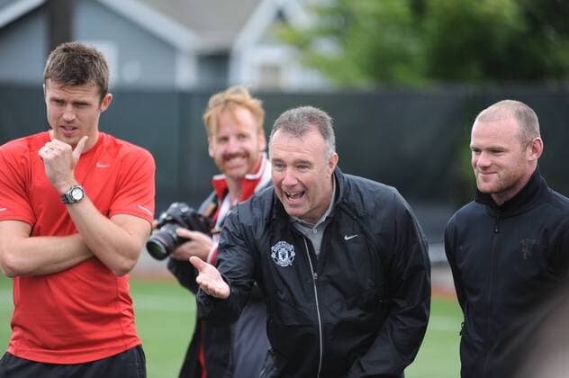 July 19, 2011 - Seattle, Washington, United States of America - Michael Carrick, Bryan Robson and Wayne Rooney at Manchester United Football Club and Special Olympics Washington host a Skills and Drills soccer clinic for Special Olympics athletes. US Tour 2011 - Jul 19 - Manchester United Special Olympics Event - ZUMAy31