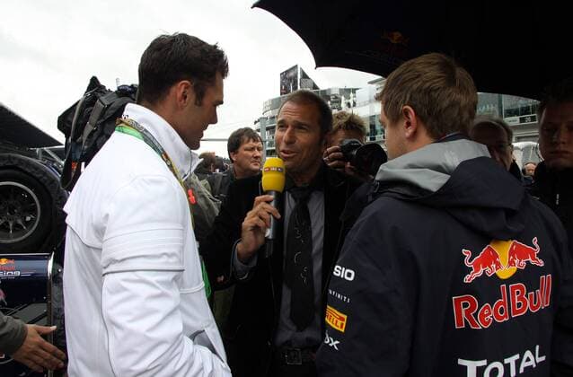 Formula 1 GP, Germany, Nürburgring, 24.07.11, Sebastian Vettel (re.), Red Bull Racing, und Martin Kaymer (li.) im Interview bei RTL Reporter Kai Ebel o0 Golf