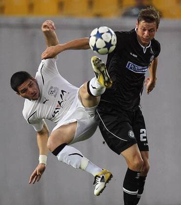 FUSSBALL - UEFA CL Quali, Zestafoni vs Sturm TIFLIS,GEORGIEN,26.JUL.11 - FUSSBALL - UEFA Champions League, Qualifikation, FC Zestafoni vs SK Sturm Graz. Bild zeigt George Oniani (Zestafoni) und Roman Kienast (Sturm). 