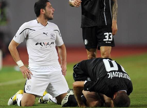 FUSSBALL - UEFA CL Quali, Zestafoni vs Sturm TIFLIS,GEORGIEN,26.JUL.11 - FUSSBALL - UEFA Champions League, Qualifikation, FC Zestafoni vs SK Sturm Graz. Bild zeigt Murtaz Daushvili (Zestafoni) und Samir Muratovic (Sturm). 