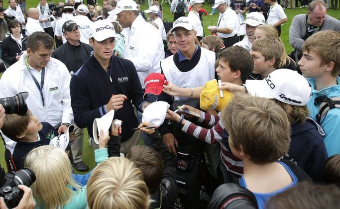 Martin KAYMER (GER) gives autographs during the Golf Schueco Match Play, Hubbelrath in Duesseldorf on July 30., 2011.