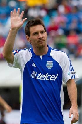 MEXICO CITY, July 31, 2011 - Player Lionel Messi greets during a charity soccer match at Azul stadium, in Mexico City, capital of Mexico, on July 31, 2011. Messi played the charity soccer match to raise money for an institution for children with cancer in Mexico. 