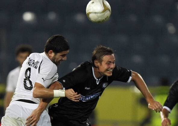 FUSSBALL - UEFA CL Quali, Sturm vs Zestafoni GRAZ,AUSTRIA,03.AUG.11 - FUSSBALL - UEFA Champions League, Qualifikation, SK Sturm Graz vs FC Zestafoni. Bild zeigt Murtaz Daushvili (Zestafoni) und Roman Kienast (Sturm). 