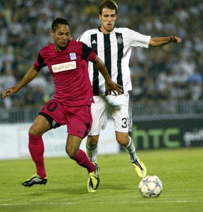 Belgrade - FK Partizan Belgrad - KRC Genk - Uefa champions league qualifying third leg - Jose Nadson (L) KRC Genk and Marko Scepovic (R) FK Partizan - 