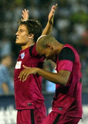 Belgrade - FK Partizan Belgrad - KRC Genk - Uefa champions league qualifying third leg - Jelle Vossen (L) with Marvin Ogunjimi (R) KRC Genk celebrate victory after match - 