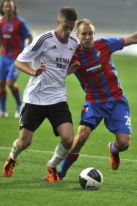 Daniel Kolar, right, from Viktoria Pilsen and Rosenborg BK Trondheim s Markus Henriksen during their Champions League second leg third qualifying round soccer match in Pilsen, (CTKxPhoto PetrxEret)  CTKPhoto102201108030886101