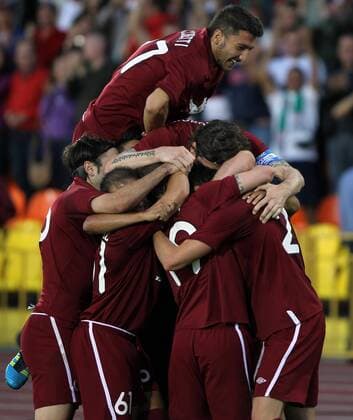 Kasan - Rubin players celebrate their victory in the 2011-2012 UEFA Champions League qualifying round match. Rubin won 2-1 vs Dynamo Kiew.  RE0EBA5E