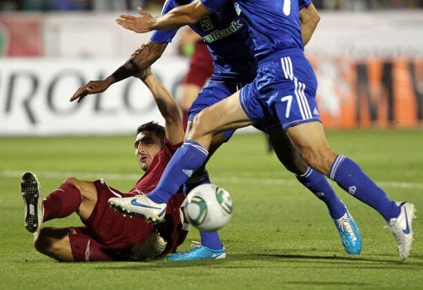Kasan - Rubin s defender Salvatore Bocchetti (red) seen in the 2011-2012 UEFA Champions League qualifying round match. Rubin won 2-1 vs Dynamo Kiew.  RE0EBA6B