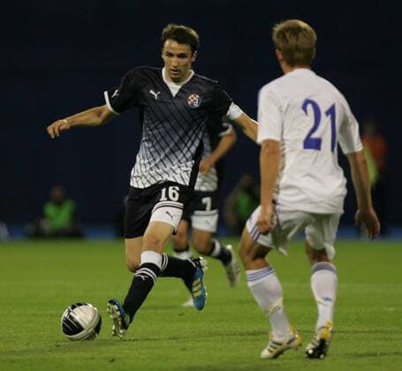 Zagreb, 03.08.2011., 3rd qualifying round, UEFA Champions League quali, NK Dinamo Zagreb (black) - HJK Helsinki (white) 1:0 - Milan Badelj (Dinamo-16) and Mikko Sumusalo (Helsinki-21) (R)
