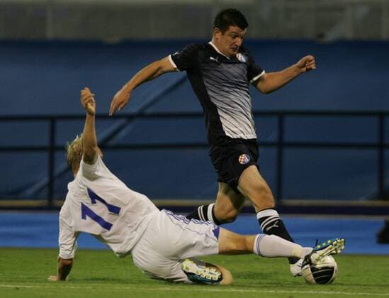 Zagreb, 03.08.2011., 3rd qualifying round, UEFA Champions League quali, NK Dinamo Zagreb (black) - HJK Helsinki (white) 1:0 - Fatos Beciraj (Dinamo-21) (R) and Mathias Lindström (Helsinki-11)
