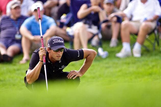 Aug. 7, 2011 - Akron, Ohio, U.S - Adam Scott lines up his putt on the 15th green during the final round of the Bridgestone Invitational at Firestone Country Club, Akron, Oh. PGA Golf Herren 2011 - Aug 7 - Bridgestone Invitational - ZUMAx09
