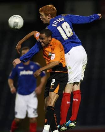 Football Carling Cup Round One - FC Portsmouth vs. Barnet FC, at Fratton Park: Portsmouth s Dave Kitson battles with Barnet s Danny Senda 09 08 2011 