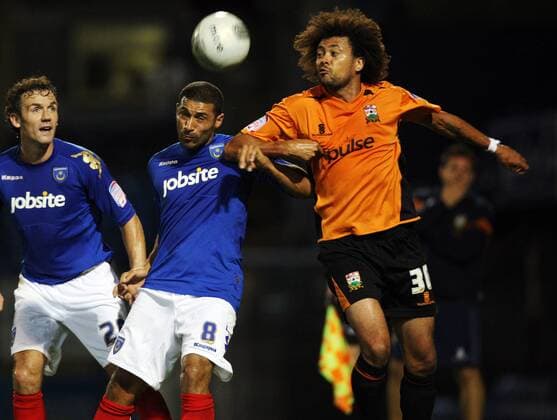 Football Carling Cup Round One - FC Portsmouth vs. Barnet FC, at Fratton Park: Portsmouth s Hayden Mullins battles with Barnet s Jason Price 09 08 2011 